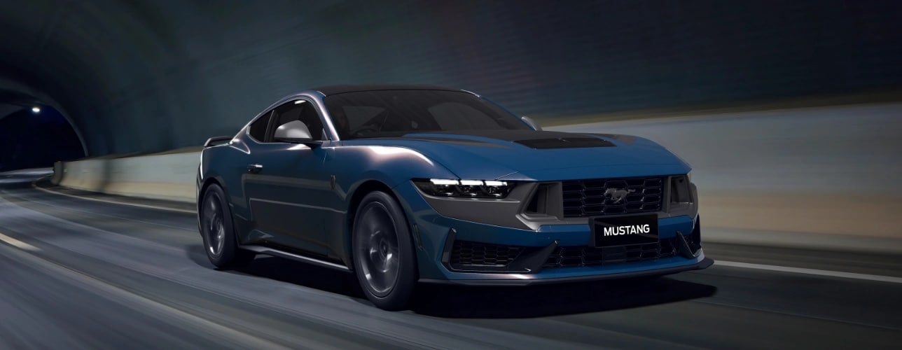 Ford Mustang Dark Horse diriving through a tunnel