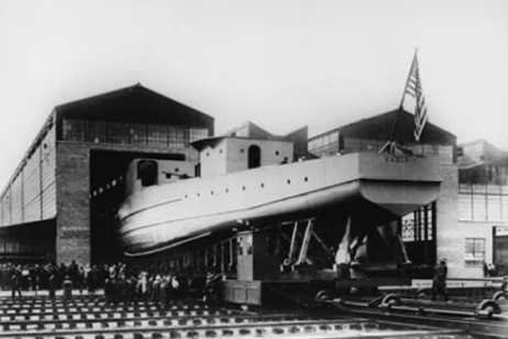 people standing in front of factory on static