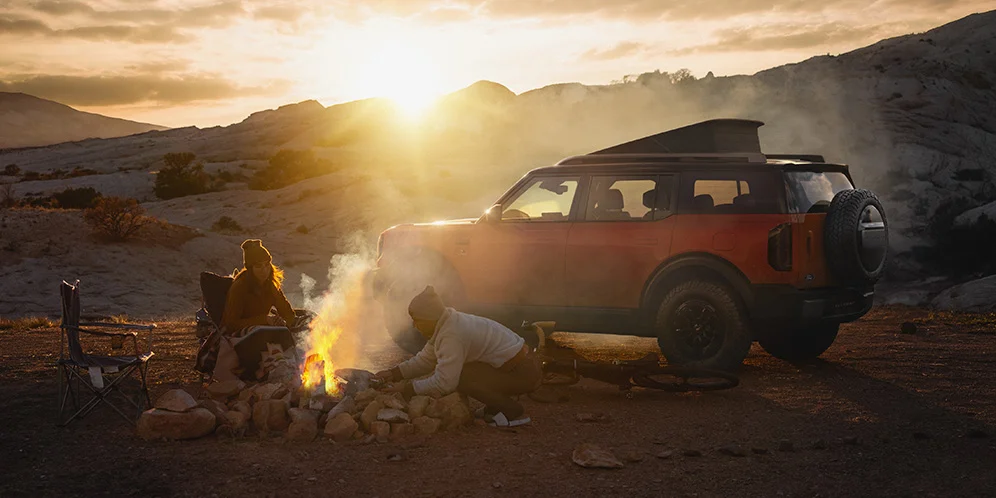 Bronco SUV with surfers