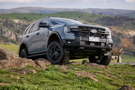 Off-road SUV on rocky hill