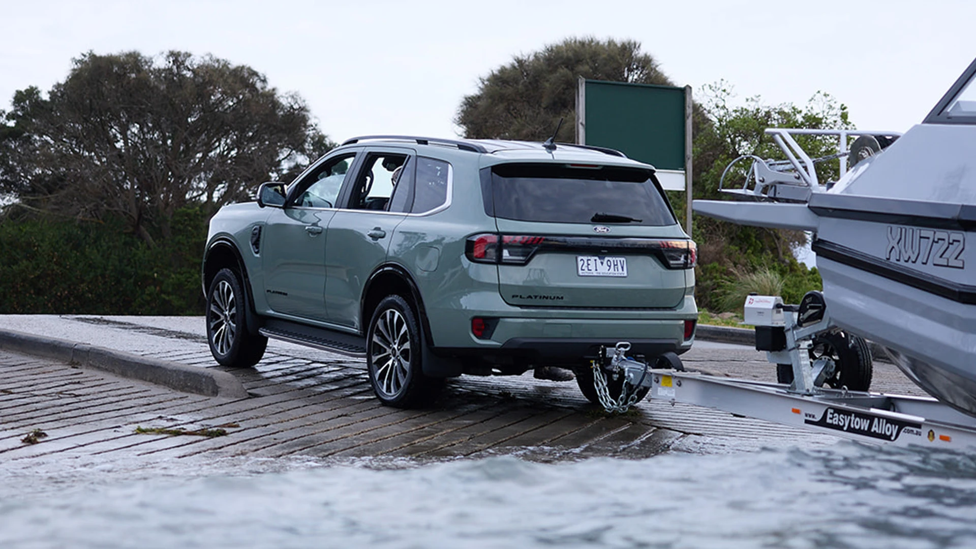 SUV launching boat at ramp