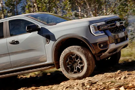 Ford Ranger Tremor grey front driving off-road.