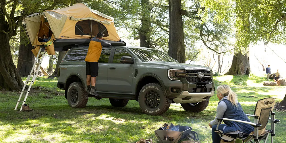 Ranger With Tent and People