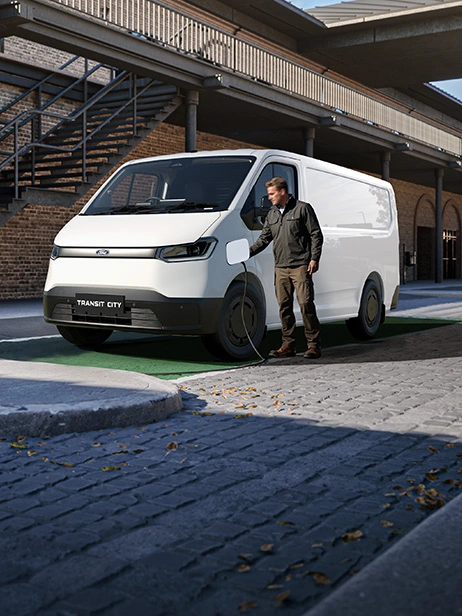 Electric Ford van plugging in