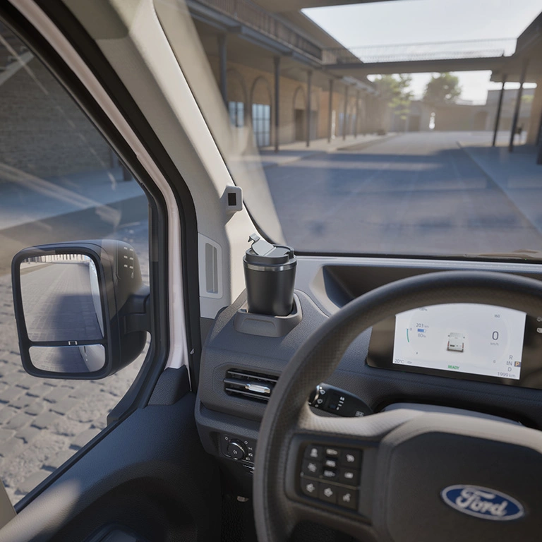 Driver seat view with mug