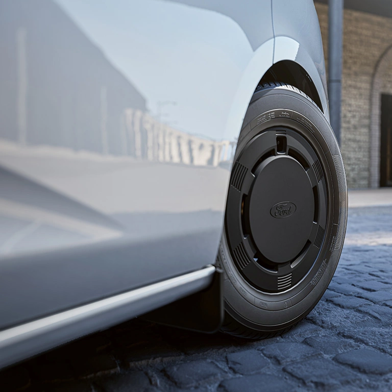 Close-up of black Ford wheel