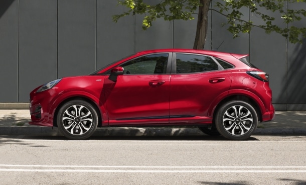 2020 Lucid Red Ford Puma ST-Line front side view parked on street
